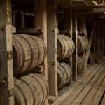rickhouse bourbon barrels stacked in rick house