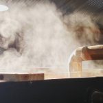 Moonshiners: steam coming from a metal thing