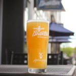 Braxton Brewing Company: glass of beer on a table outside